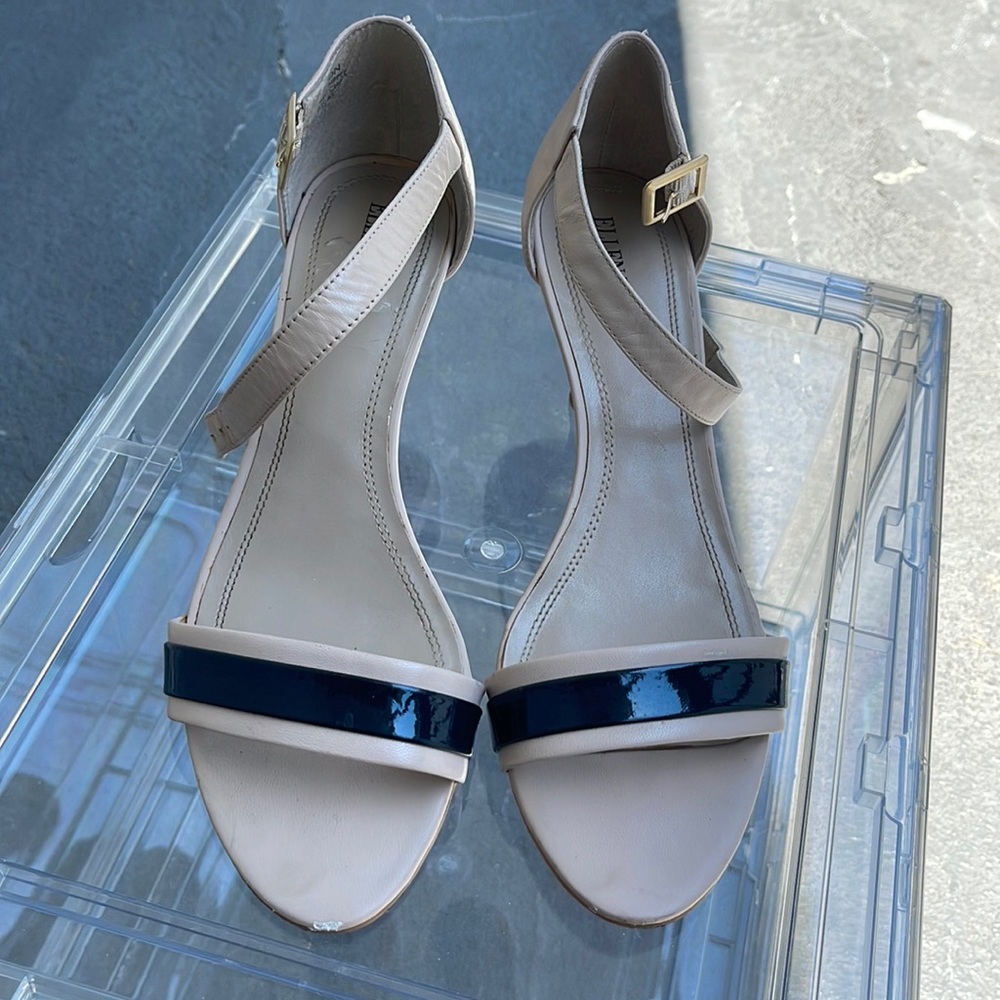 Nude and navy strapy kitten heels.